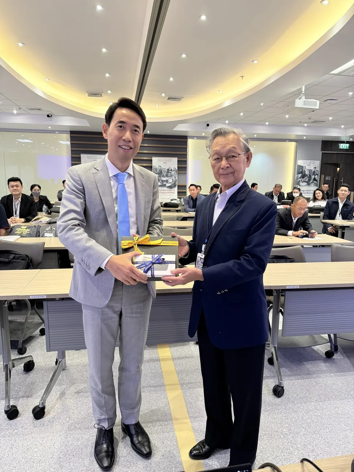 TOPSUN representative receiving recognition at NIDA event